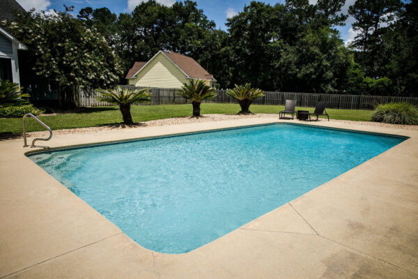 3 Ways a Concrete Pool Deck is Better Than a Wooden One