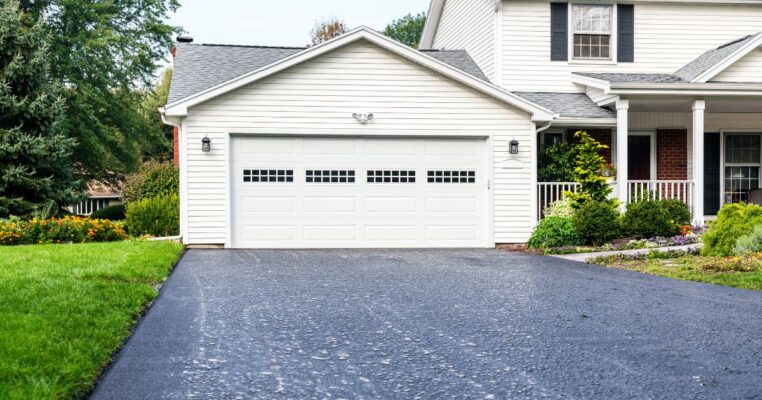 Asphalt driveway in front of house